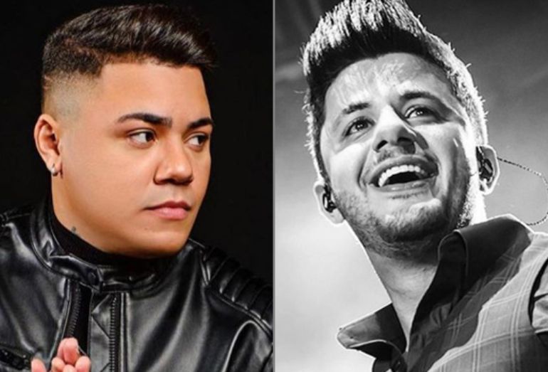 O cantor sertanejo Felipe Araújo falando ao microfone durante um evento social, com expressão serena.